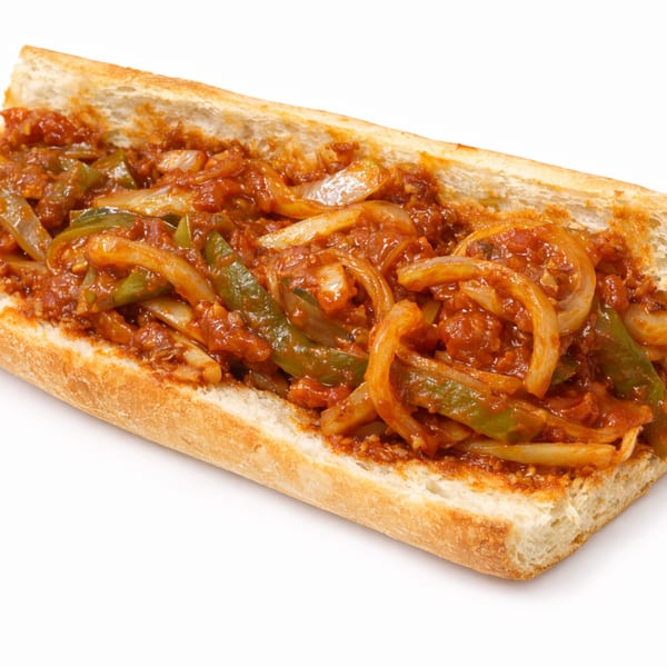 Rocco's NY Pizzeria & Pasta's sausage, peppers, and onions hero on a white background.