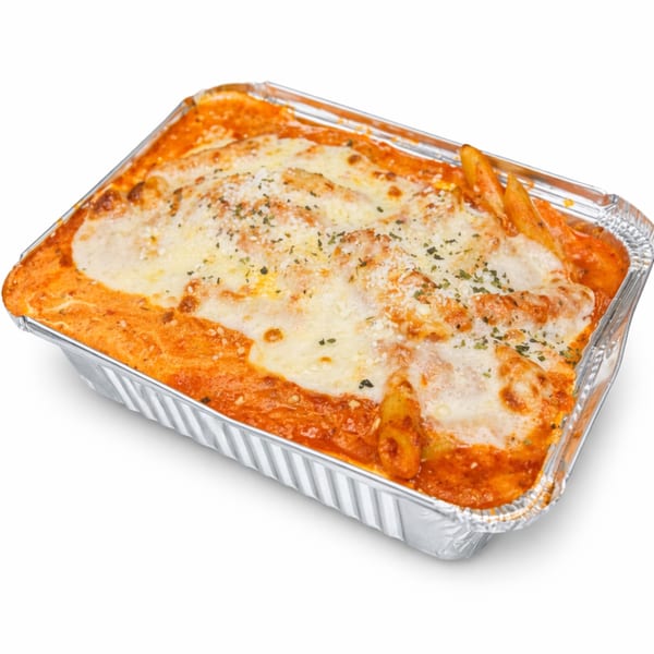 Baked ziti with melted cheese and red sauce in a foil takeout container from Rocco's NY Pizzeria & Pasta.
